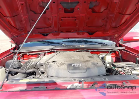 2013 Toyota Tacoma Base V6 z USA, uszkodzony, nr VIN 3TMLU4EN2DM105557